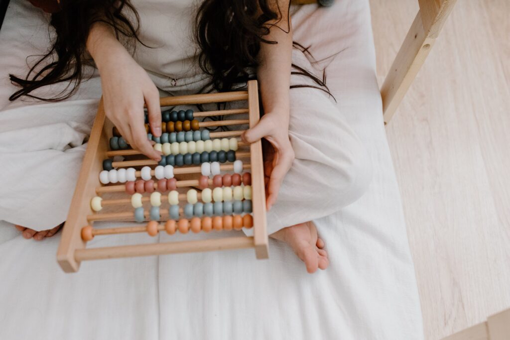 adult woman with abacus