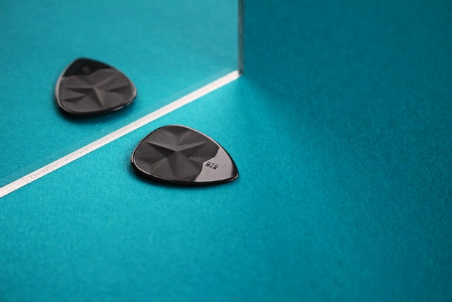 guitar pick to Protect Fingertips While Playing Guitar