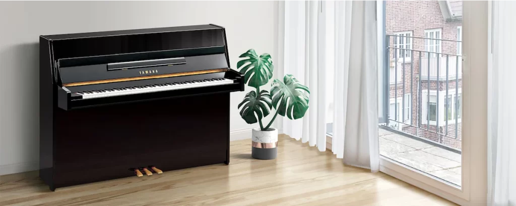 piano in the corner of the room