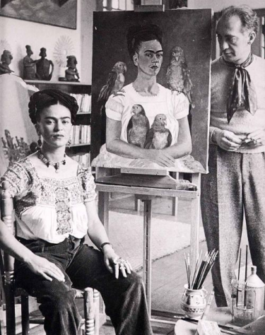 Frida, Muray with her painting 'Me and My Parrot'