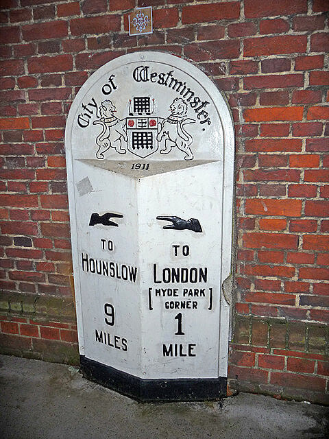 A milestone in Westminster showing the distance from Kensington Road to Hounslow and Hyde Park Corner in miles